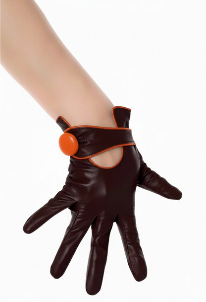 dark brown genuine leather gloves with side orange button shown  on a single model's hand against a white background.