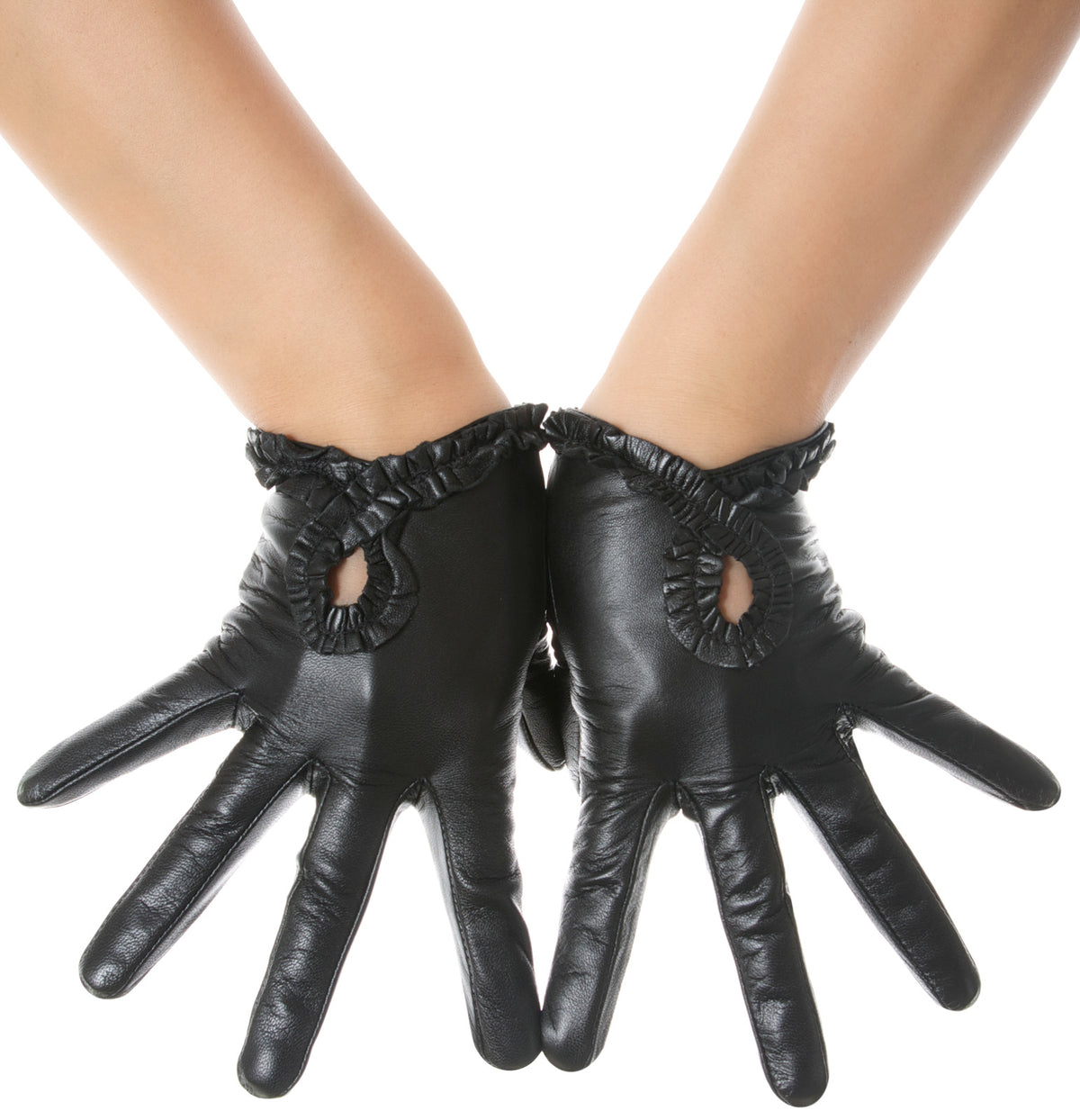 Black leather gloves with ruffled cuffs and cutout details on the back of the hand, shown on a model's hands against a white background.